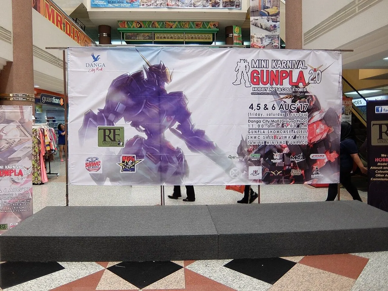 Assembled Gundam model kits of different grades